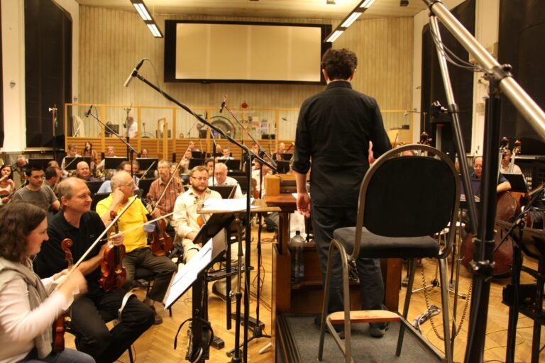 Mark Slater conducting from the podium